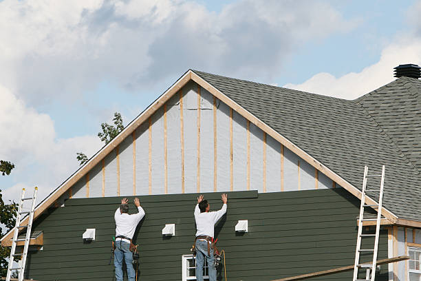 Professional Storm Damage Siding Repair technician working in Mulberry, OH
